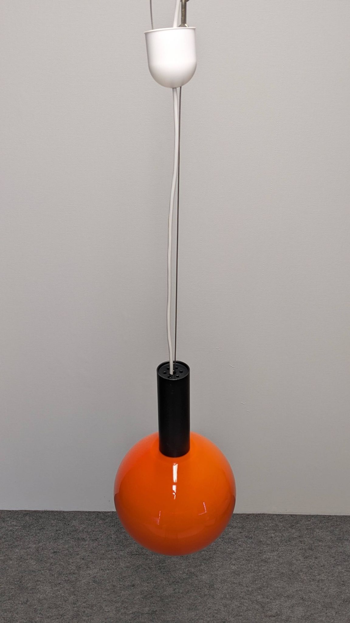 Orange opaline ball pendant by Parscot, France circa 1970.