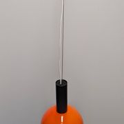 Orange opaline ball pendant by Parscot, France circa 1970.