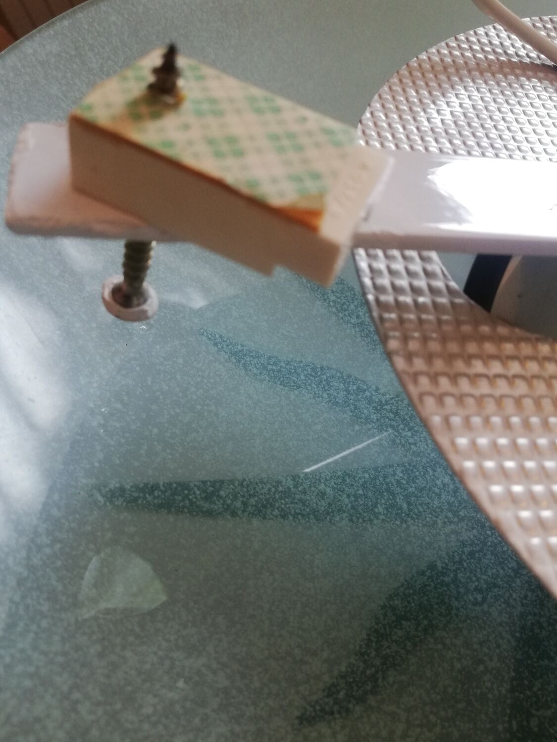 White opaque glass ceiling light and golden metal sun