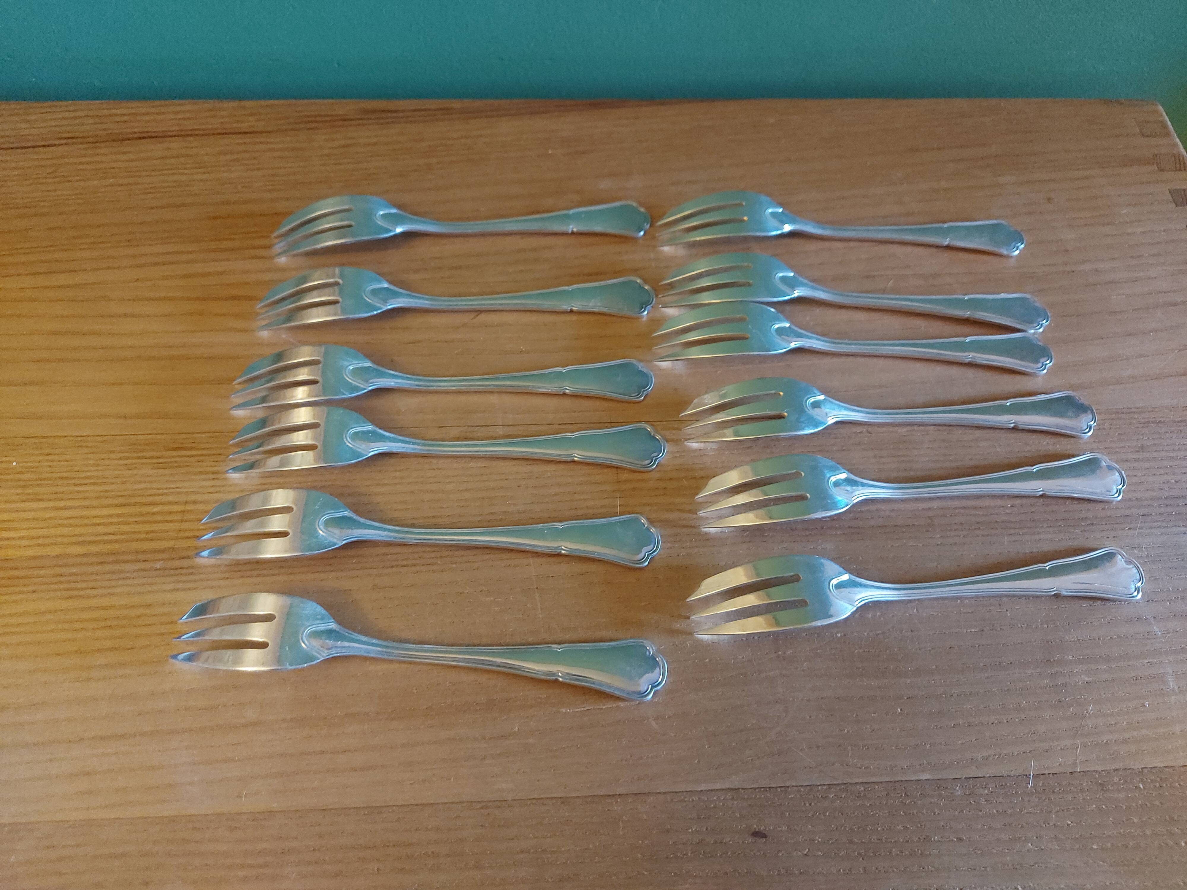Box of 12 dessert forks in silver metal