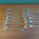 Box of 12 dessert forks in silver metal