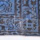 Vintage blue and black Turkish rug with traditional design, 163 × 268 cm