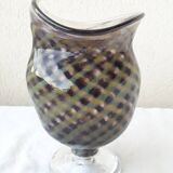 Glass vase on a stand