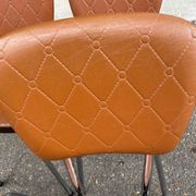 Set of 4 vintage camel faux leather quilted chairs with chrome metal by Soudexvinyl from the 70s.
