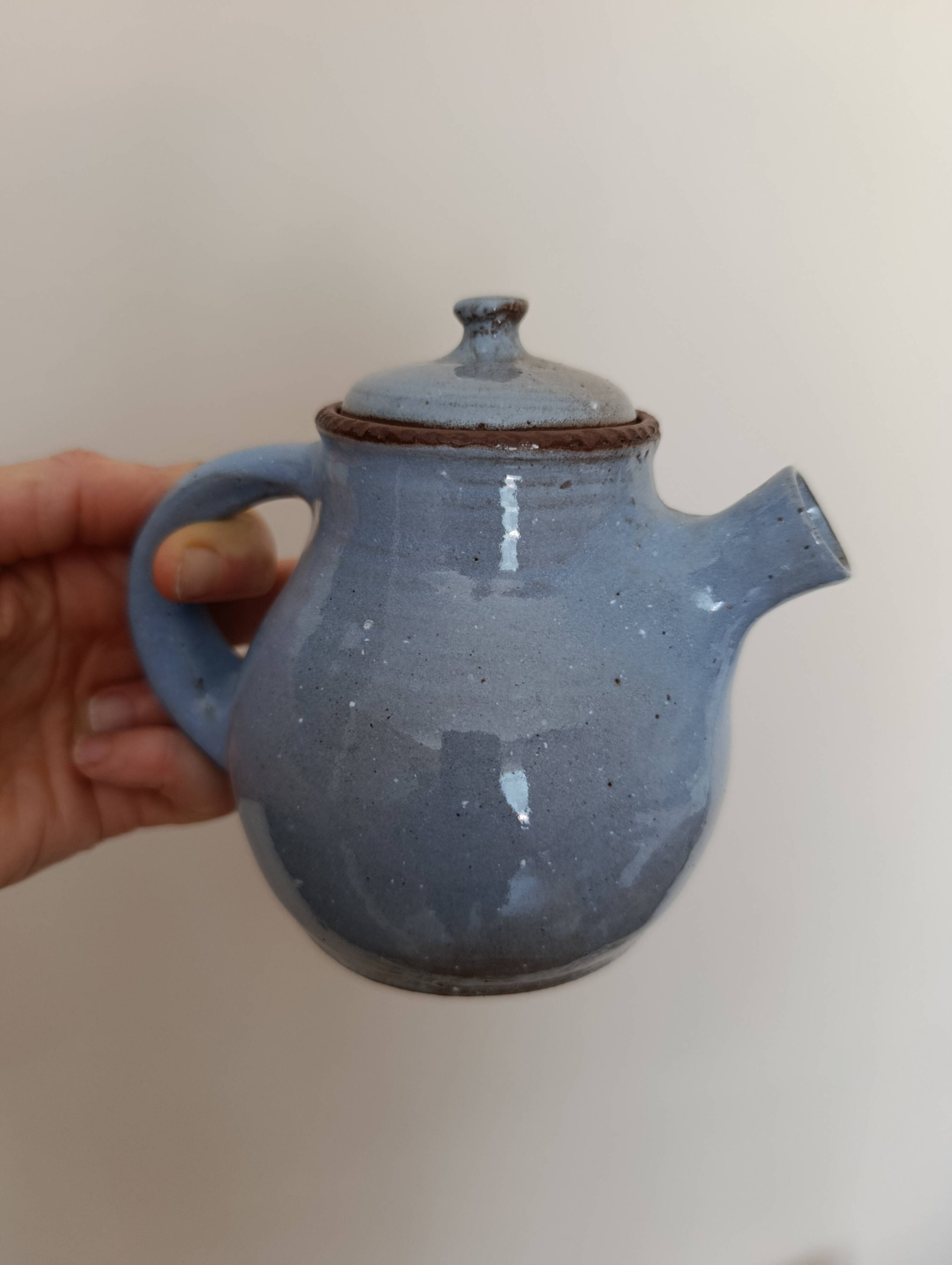 Ceramic teapot in blue/grey glaze, signed by Jeanne and Norbert Pierlot.