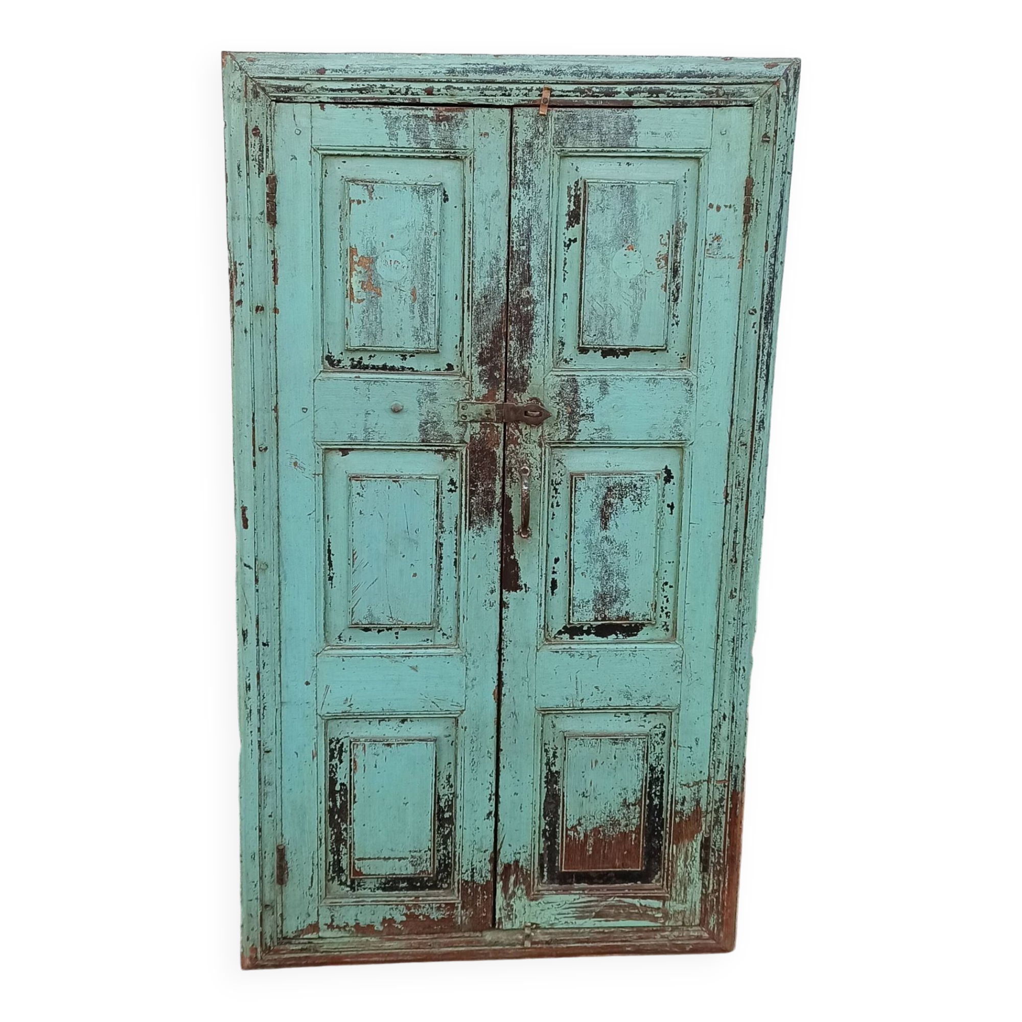 Old wooden cabinet with beautiful green patina