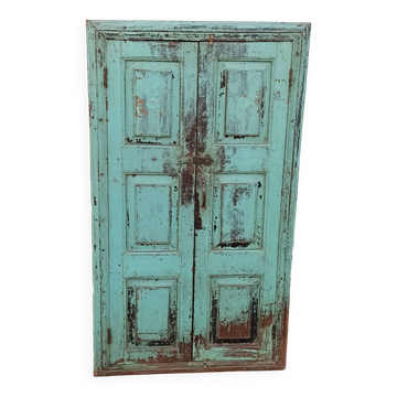 Old wooden cabinet with beautiful green patina