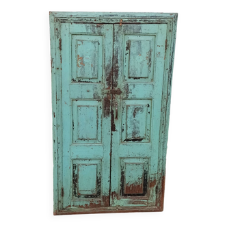Old wooden cabinet with beautiful green patina