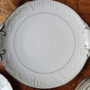 Silver-edged dessert service and its dish