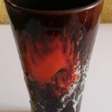 Service to orangeade of Vallauris ceramic lava aspect of black, red and white color.