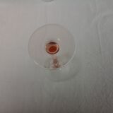 6 glasss of wine on pink foot