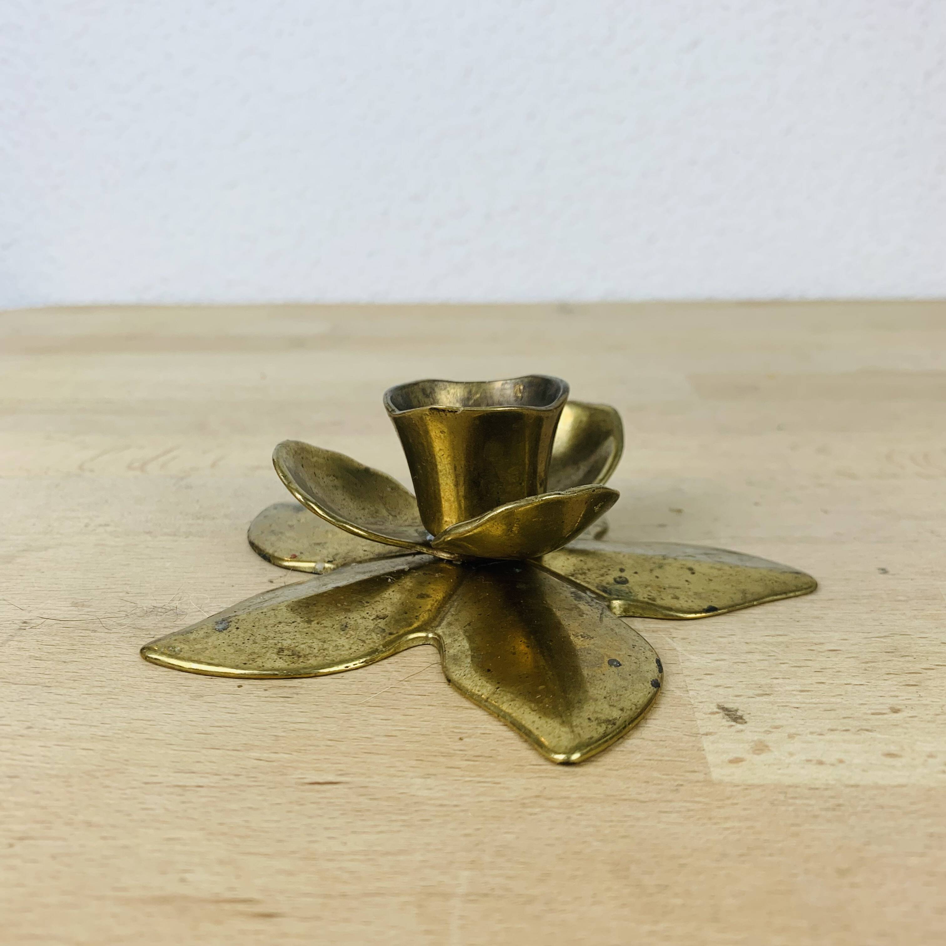 Golden brass flower candle holder
