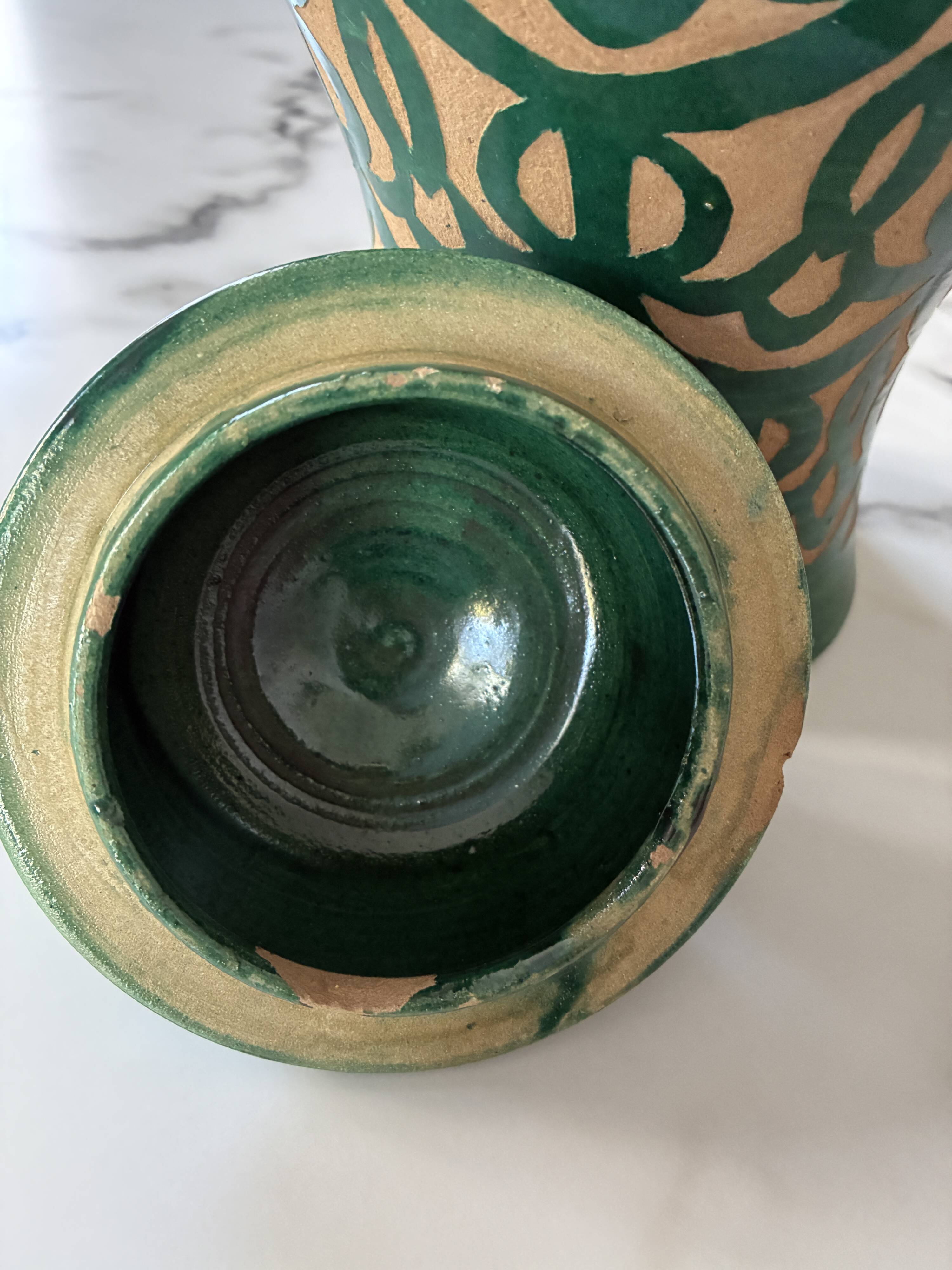 Sculpted terracotta pot