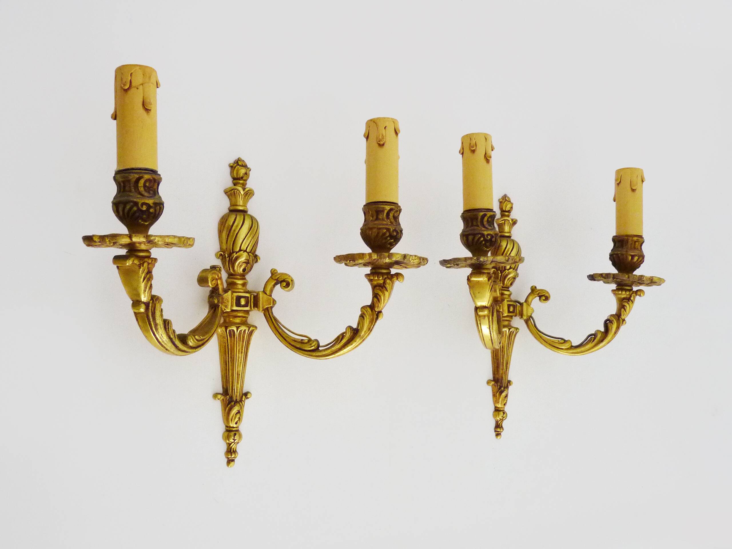 Old pair of bronze double-light wall sconces. 60s