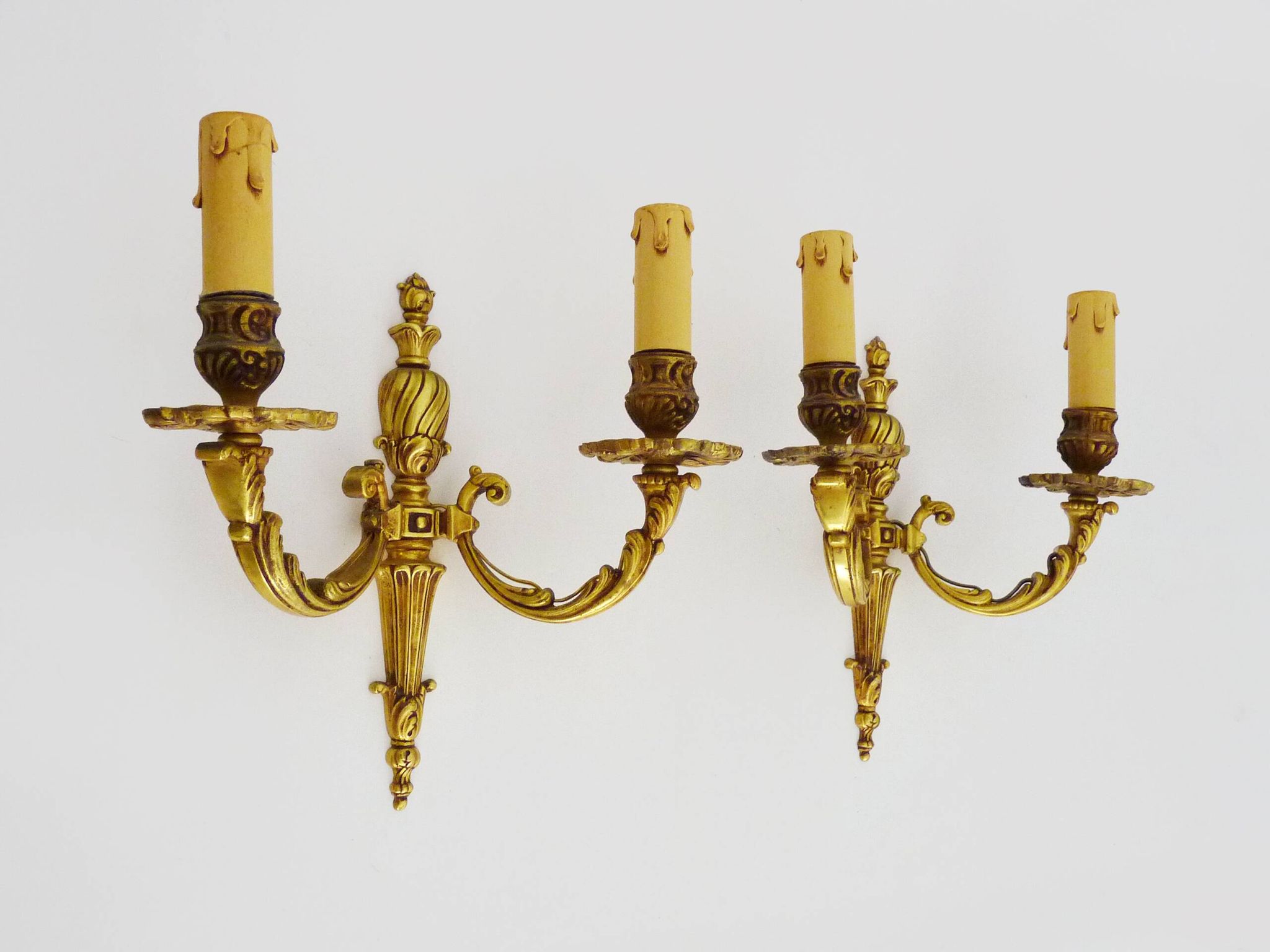 Old pair of bronze double-light wall sconces. 60s
