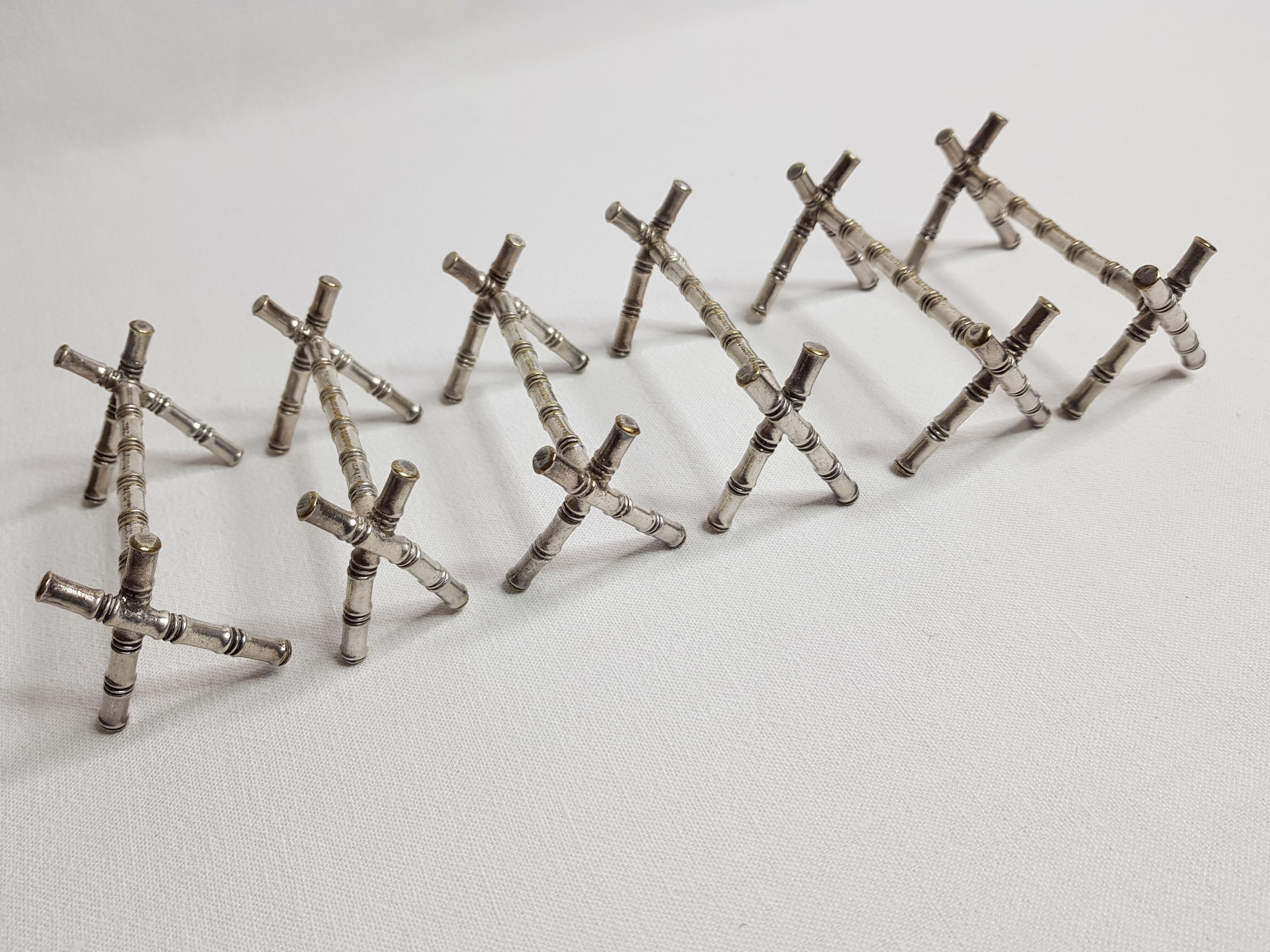 Set of six knife holders in silver metal in imitation of bamboo