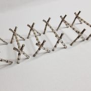 Set of six knife holders in silver metal in imitation of bamboo