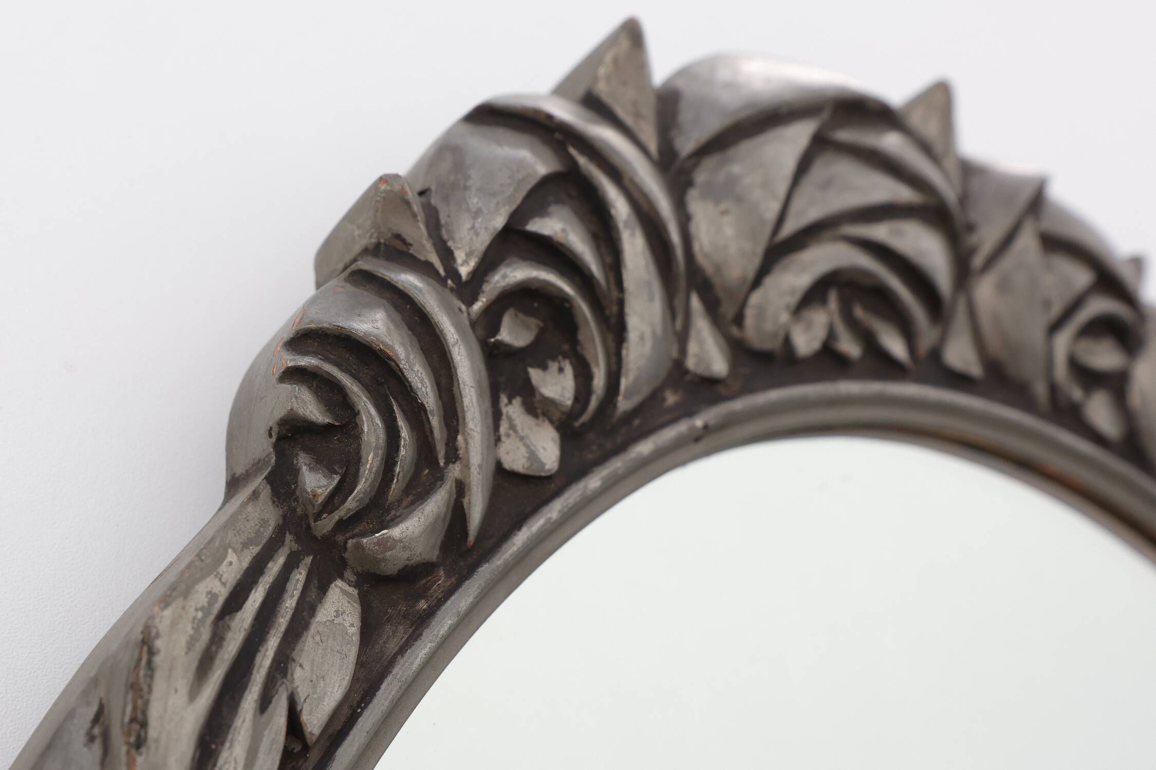 French Art Deco Oval Mirror with Carved Roses and Silver-Painted Frame
