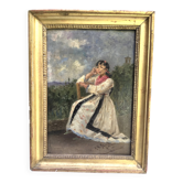 Oil on framed panel, young girl in front of a landscape signed Vico.