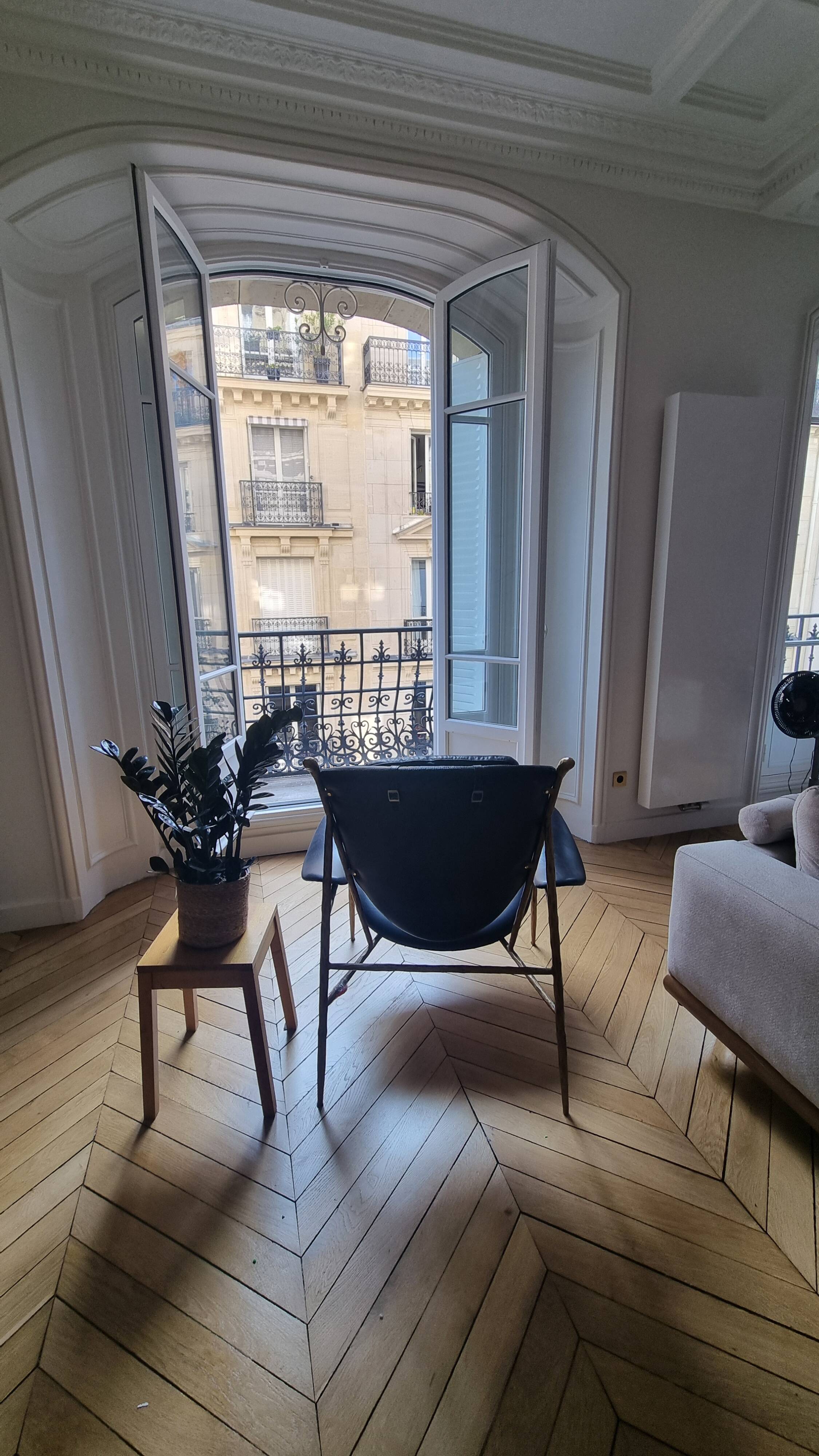 Black and golden bronze designer armchair