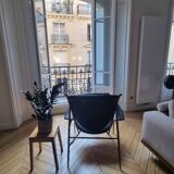 Black and golden bronze designer armchair