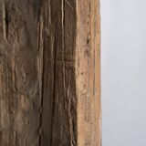 Indonesian construction element in carved wood with cross pattern in red, white geometric frieze