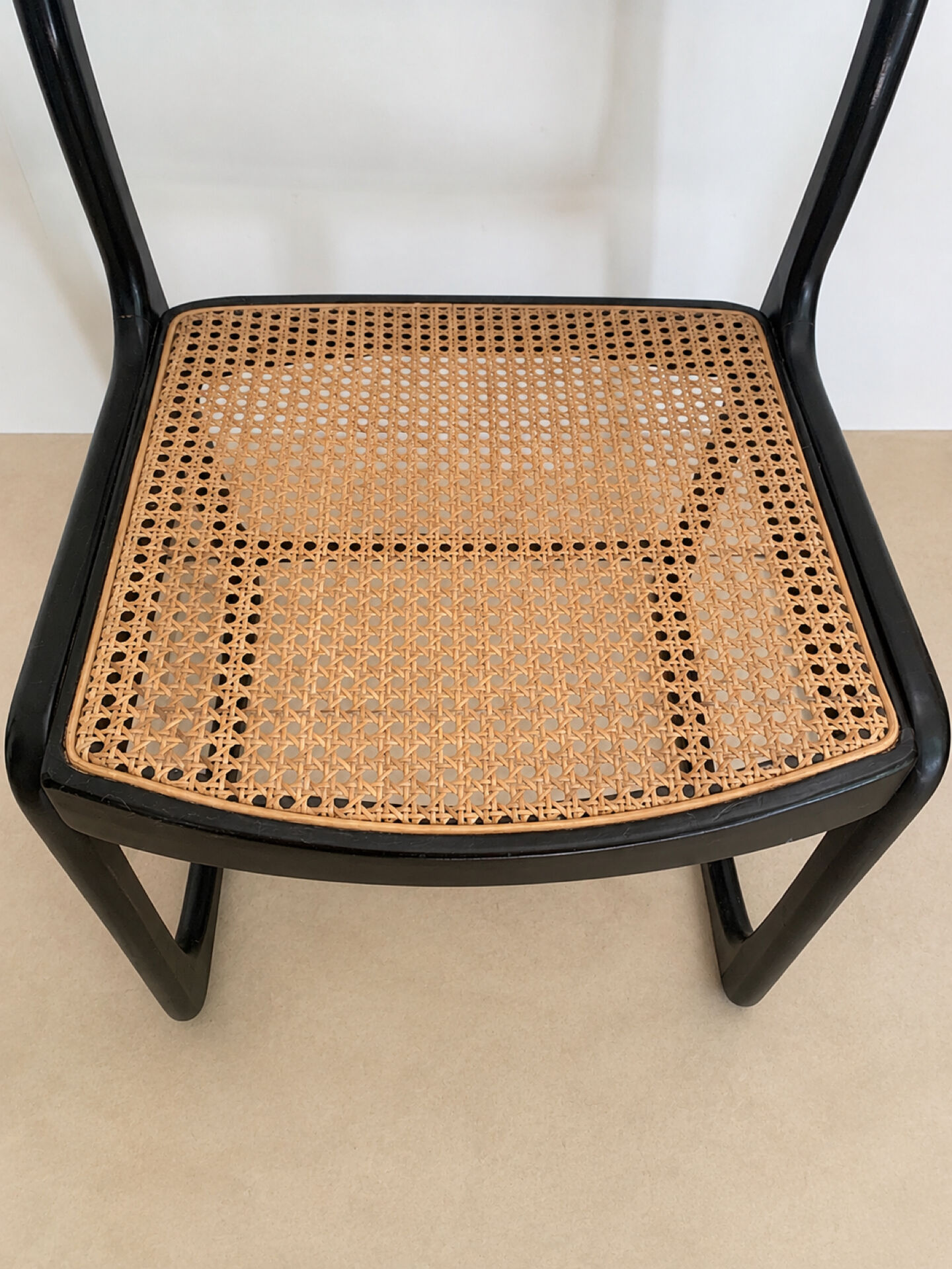 Set of 4 Baumann sled chairs with caning.