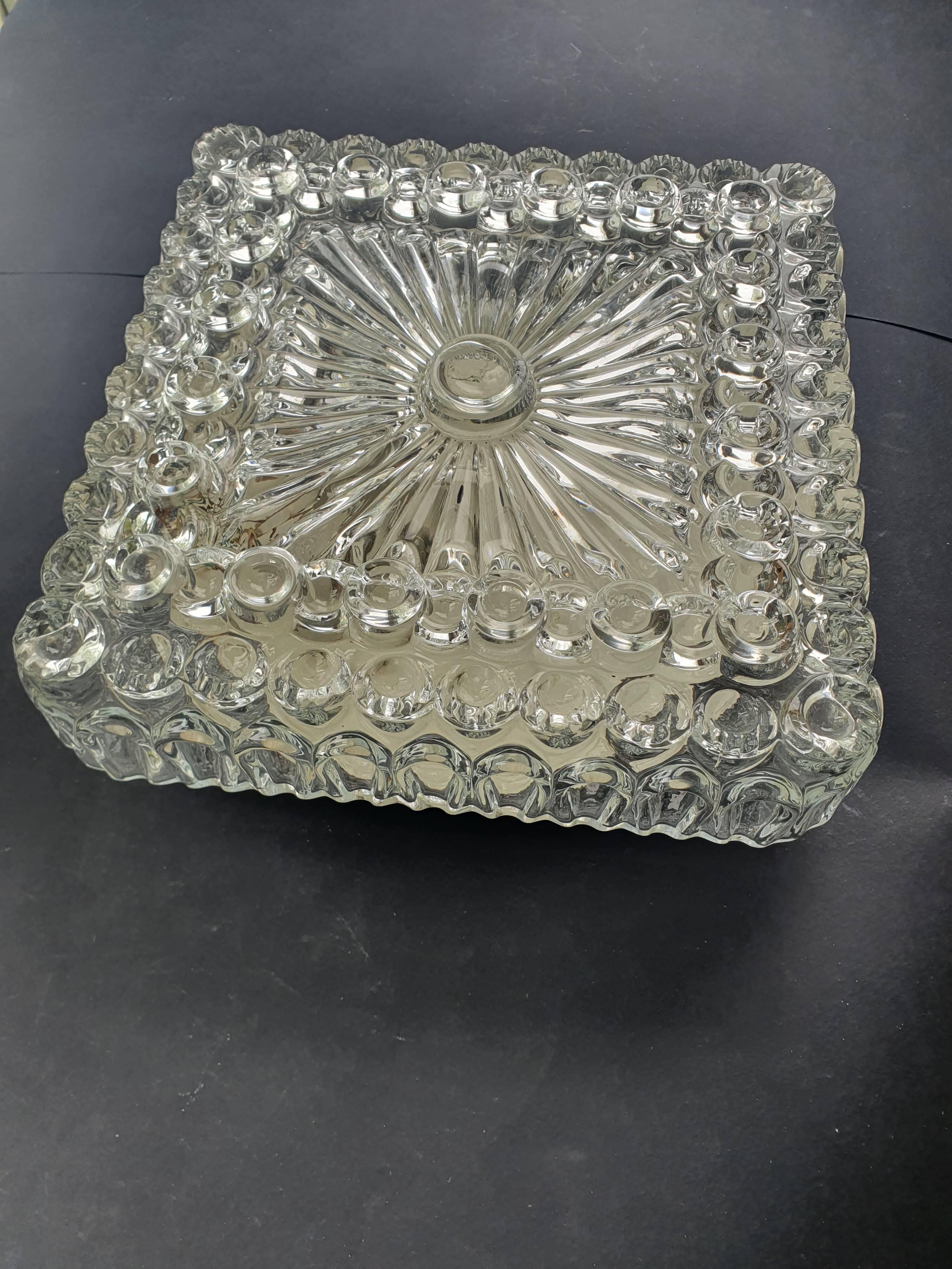 Large ceiling light or vintage wall sconce from the 1970s.