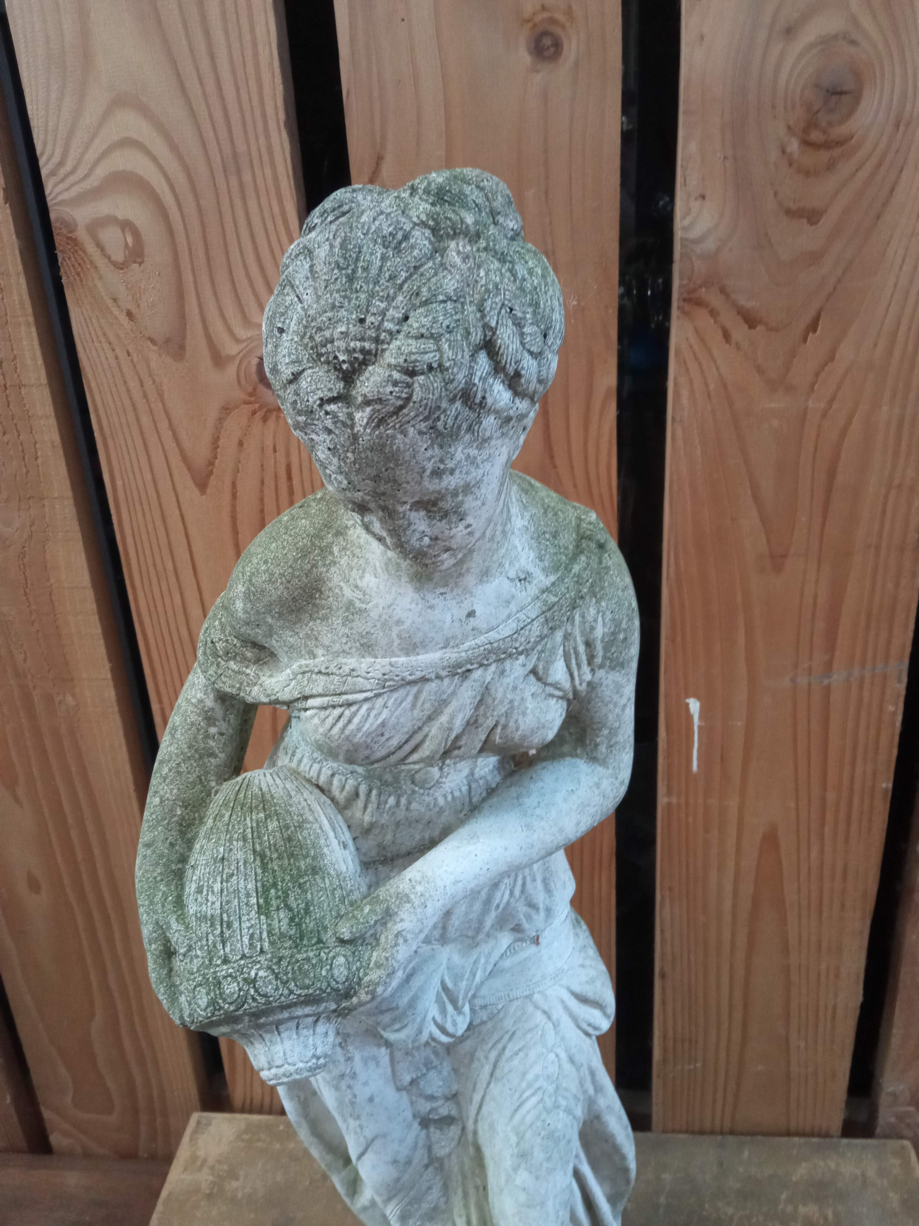 Reconstructed stone garden statue