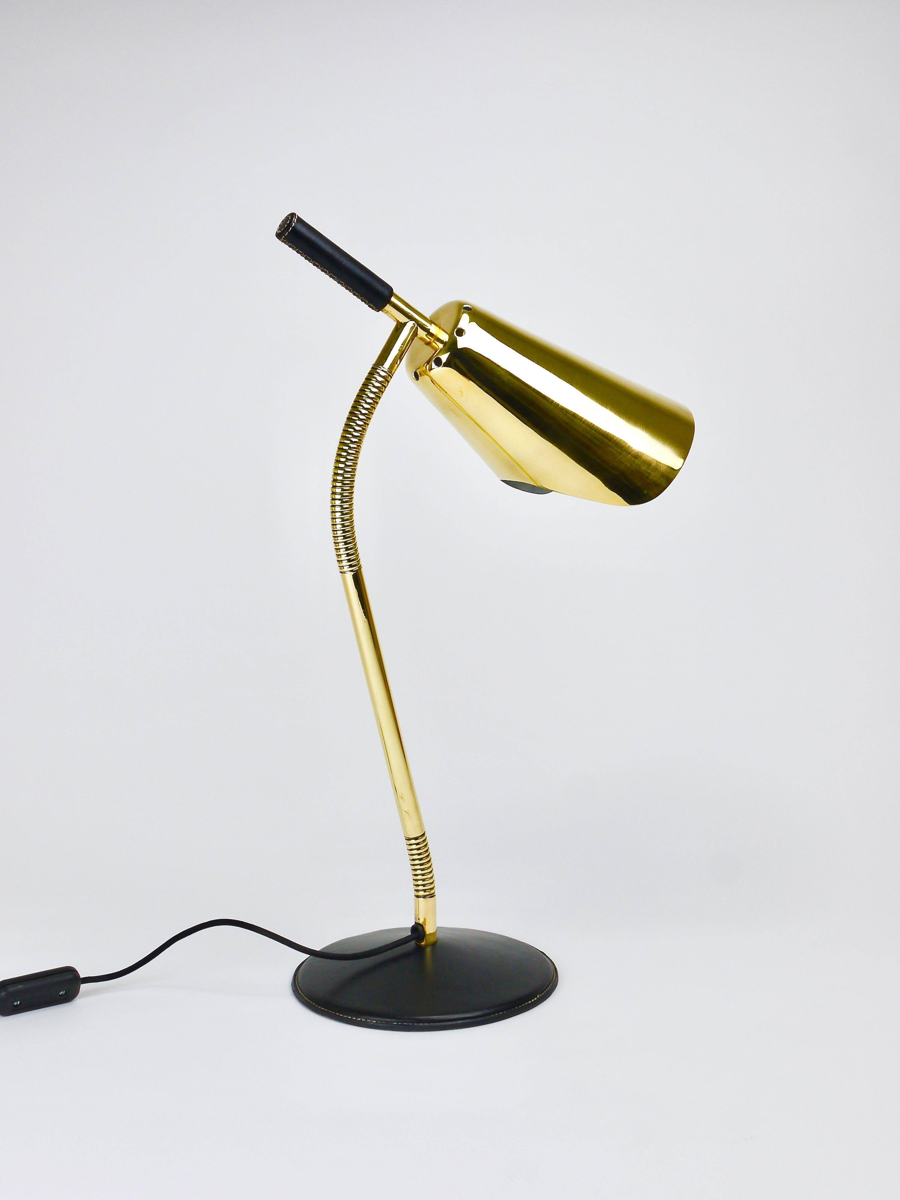 Rare desk and table lamp in brass and leather by Carl Aubock II #4280, Vienna, Austria.