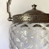 Old biscuit bucket in glass and metal