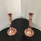 Pair of pink copper candlesticks