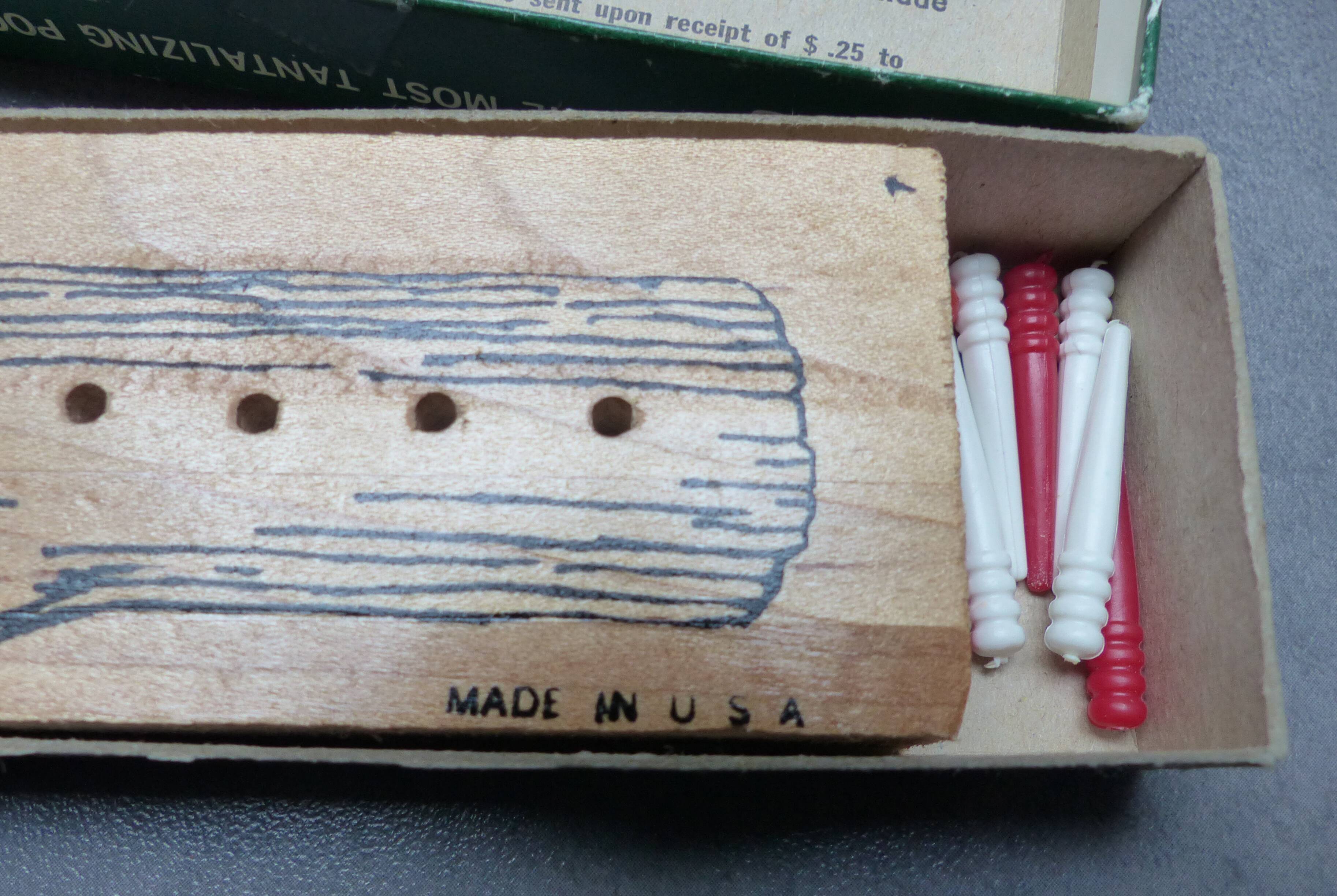 Wooden game "8 men in a log"