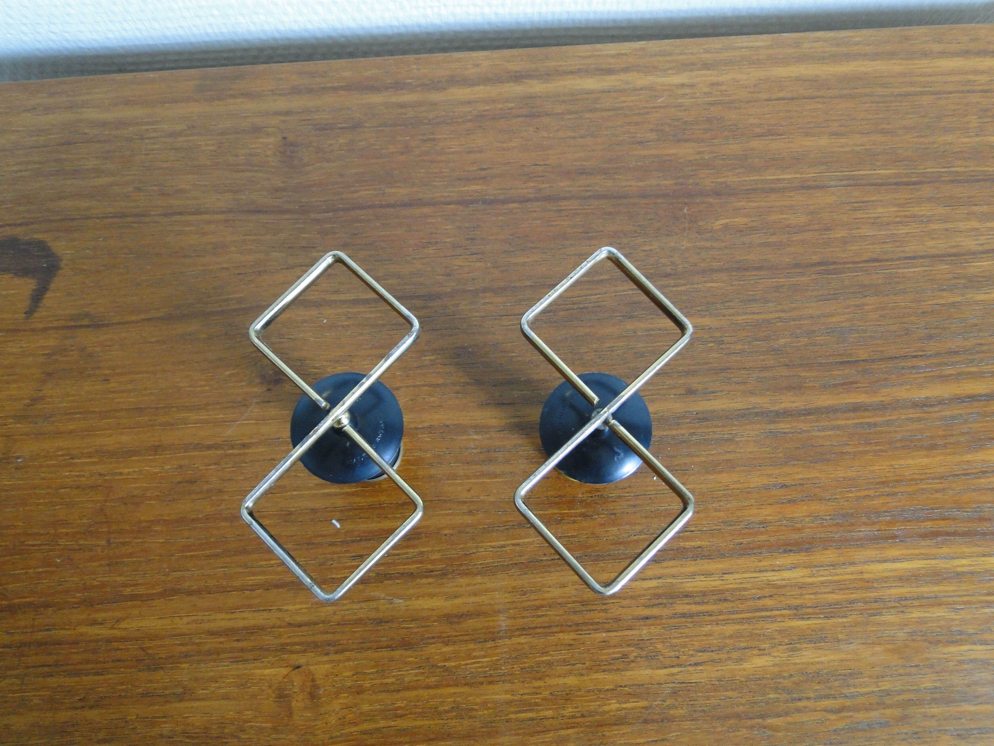 Pair of vintage candle holders in black metal and brass Sweden 1960