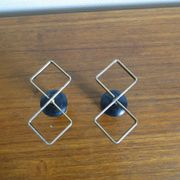 Pair of vintage candle holders in black metal and brass Sweden 1960