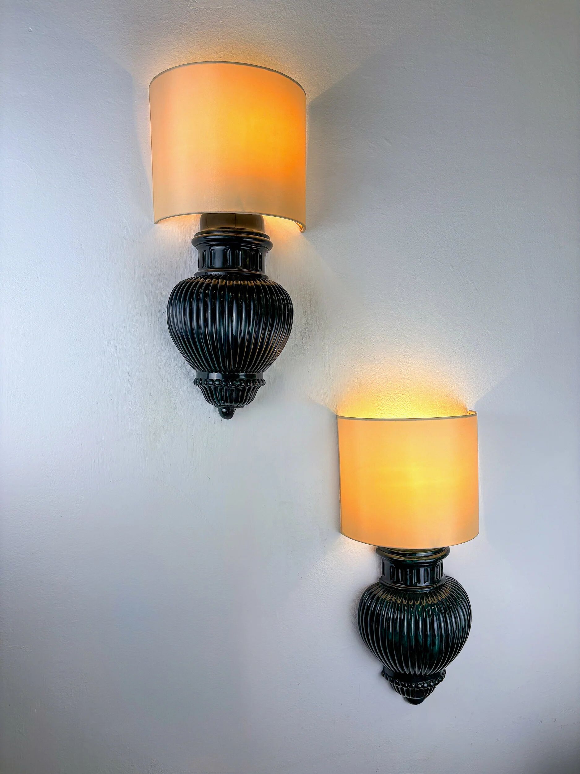 Pair of Art Deco wall lights with shades in glazed cast ceramic,Italy,1970s