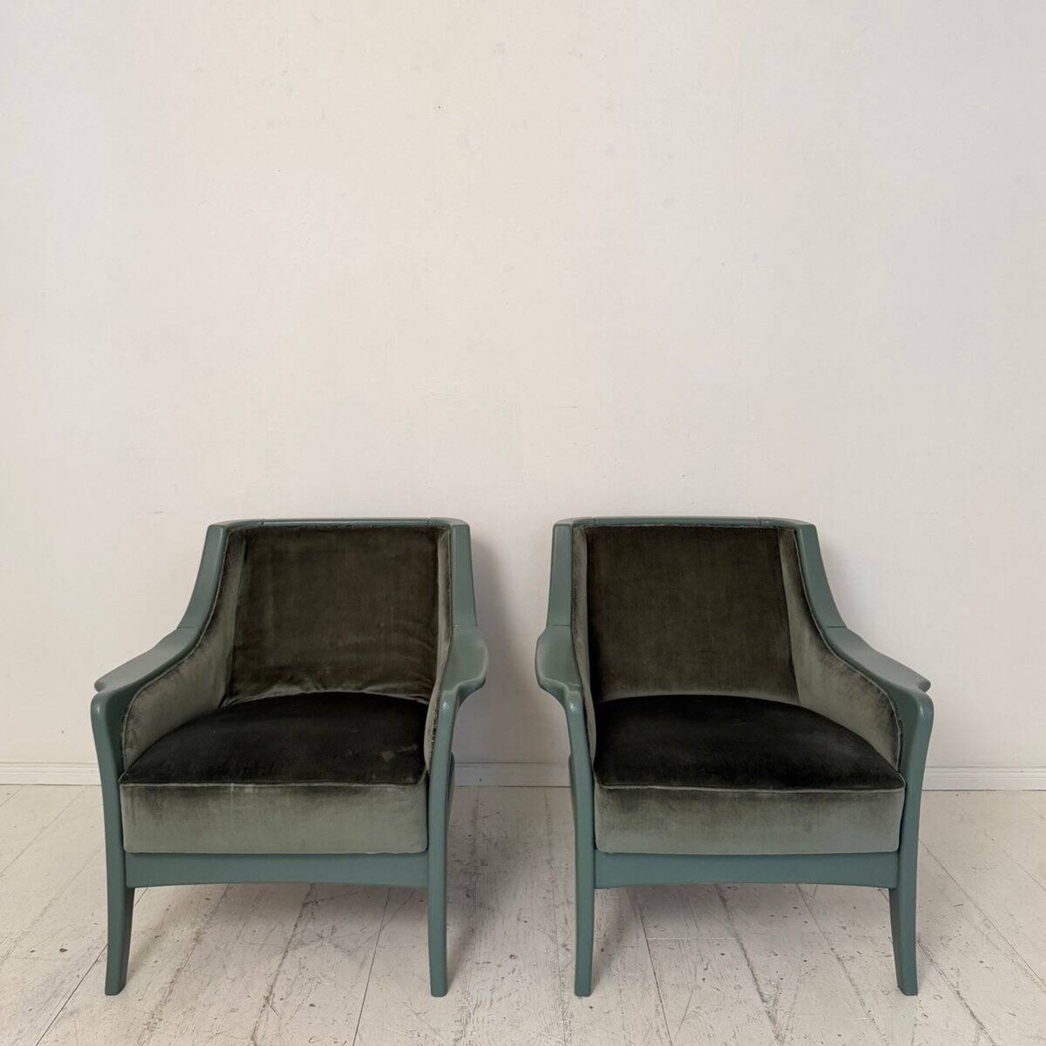 Pair Lounge Chairs in green velvet and lacquered wood, France, 1950