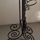 Twisted wrought iron floor lamp with plant holders from the 50s and 60s