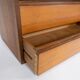 Wall mounted cabinet in teak of danish design from the 1960s.