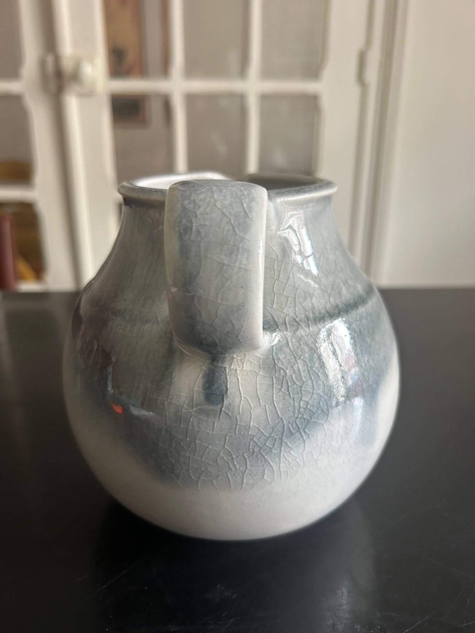 large blue ceramic pitcher