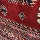Tapis mural aux motifs orientaux.