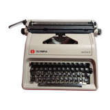 Machine à écrire vintage Olympia Carina 2 années 80