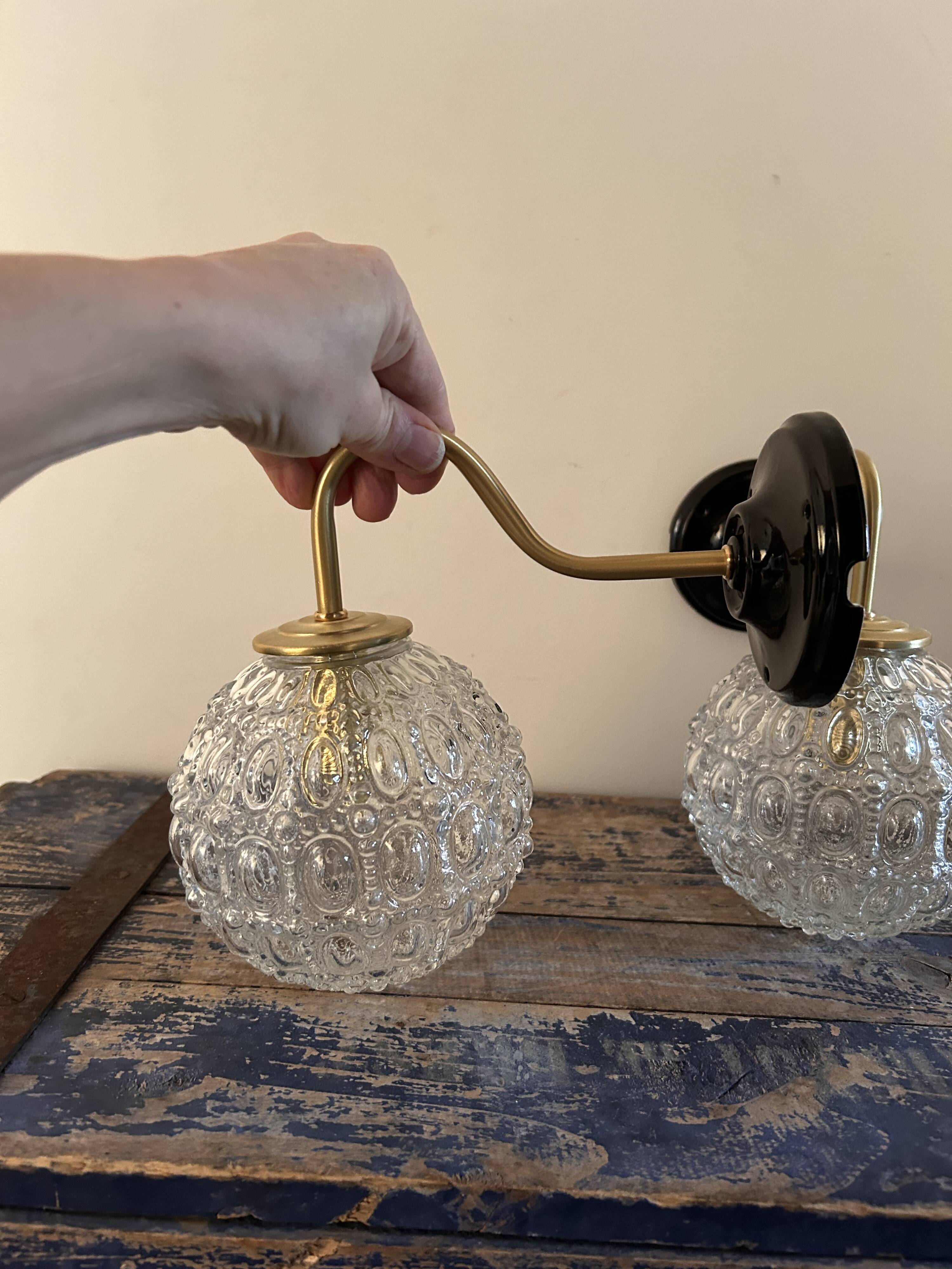 Pair of globe wall lights
