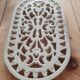 Dessous de plat en fonte