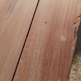 Low farmhouse table in raw wood