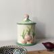 Pot with lid in slip decorated with new onions / garlic. Manufacturer: HANDARBEIT Italy