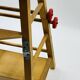 Chaise haute poupée vintage en bois transformable trotteur