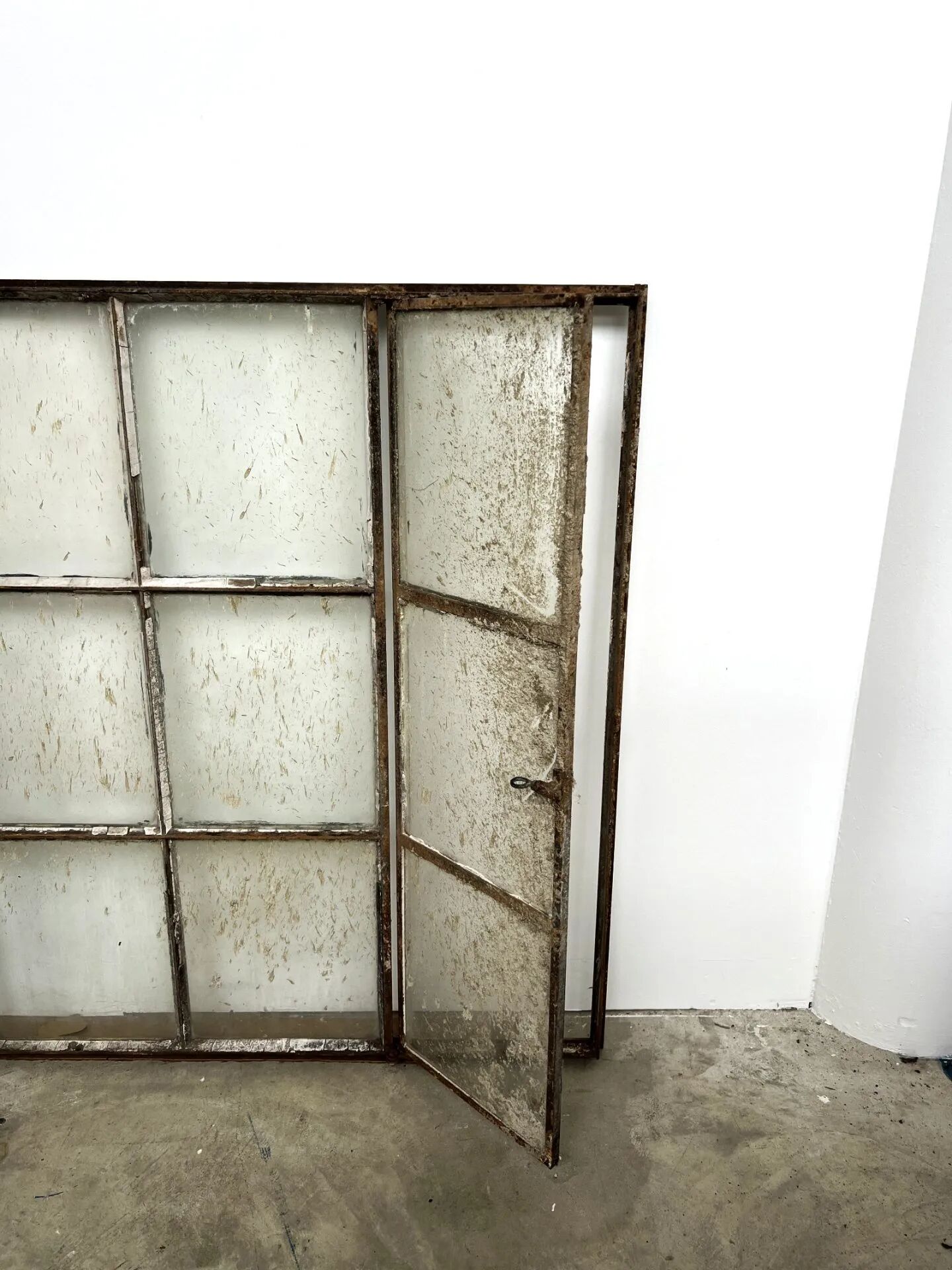 Old steel workshop skylight with opening.