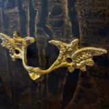 Black painted chest of drawers with golden Japanese bamboo effect