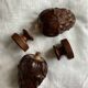 Set of 2 old pine cone shaped wooden tips